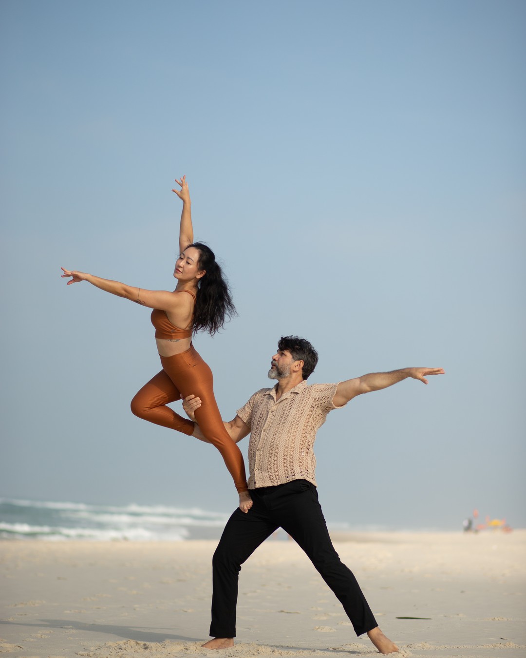 Duo em linha na praia